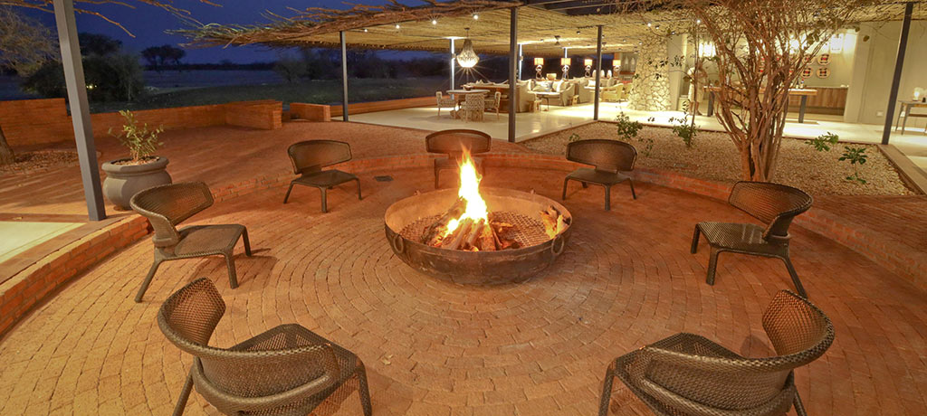 Africa Namibia Anderssons at Ongava fire pit 